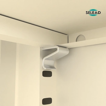Integrated cable management port on back of cream metal TV console cabinet